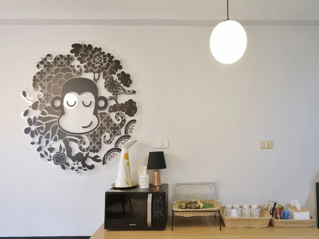 Monkey mural above the snack and drink station at Blu Monkey Boutique Bangsaen